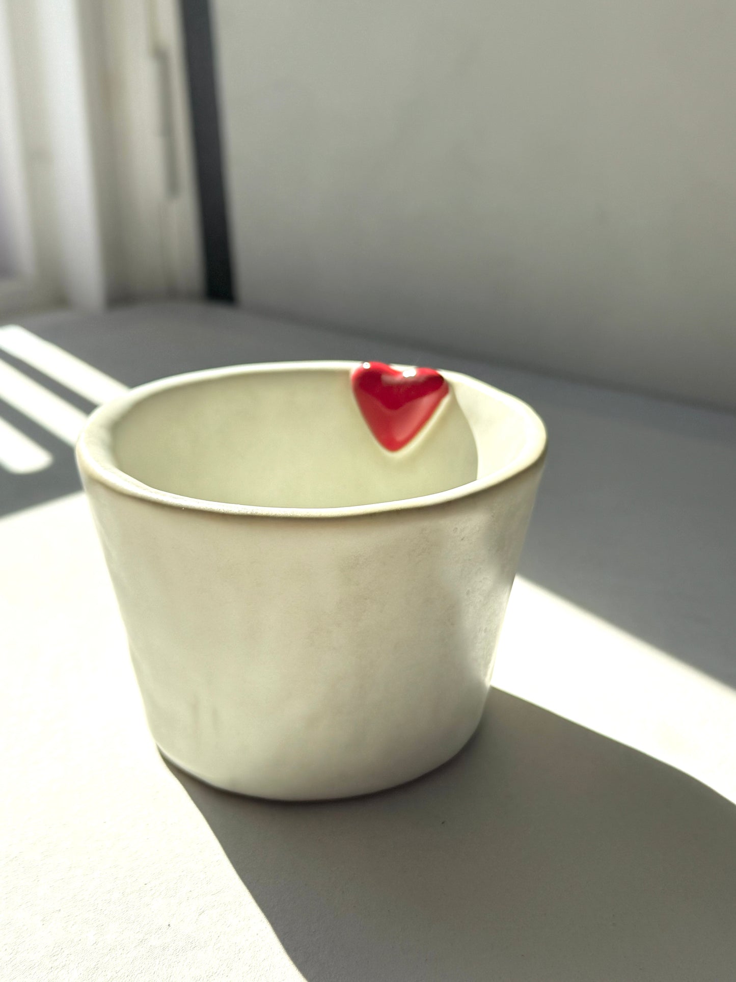 Handcrafted Ceramic Cup with Red Heart Accent