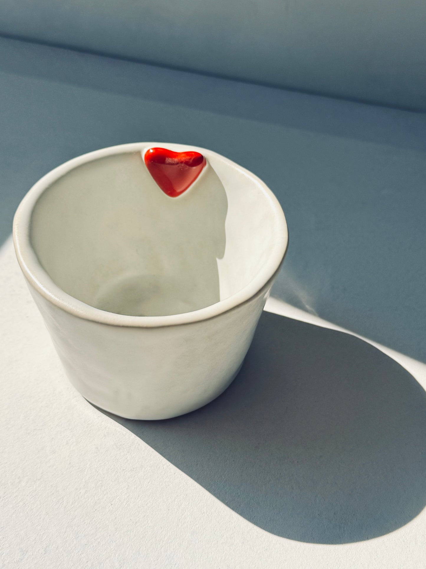 Handcrafted Ceramic Cup with Red Heart Accent