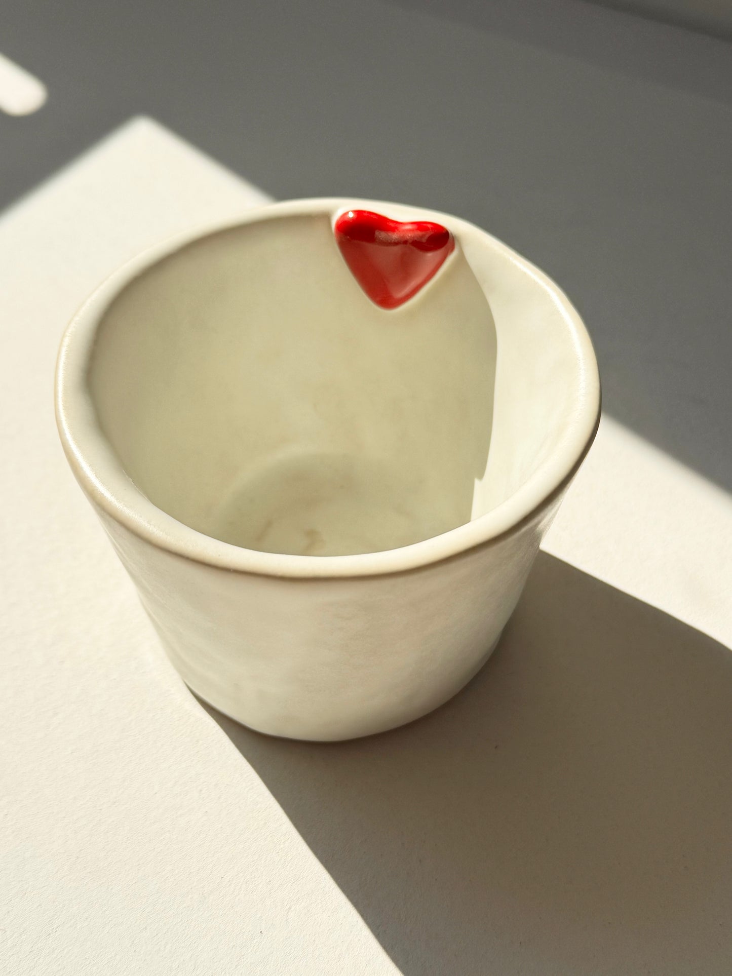 Handcrafted Ceramic Cup with Red Heart Accent
