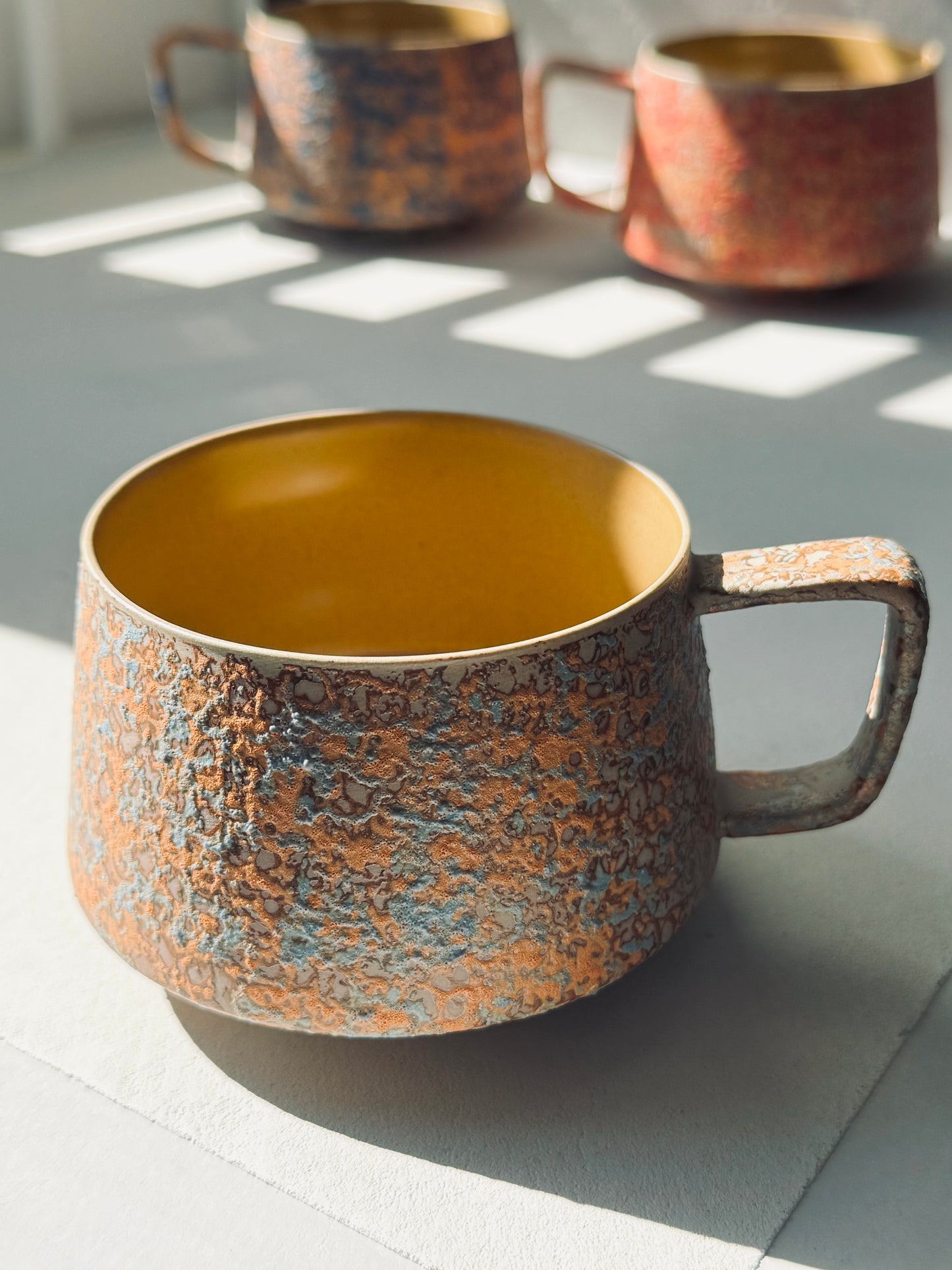 Textured Ceramic Mug – Ocean Ember Edition