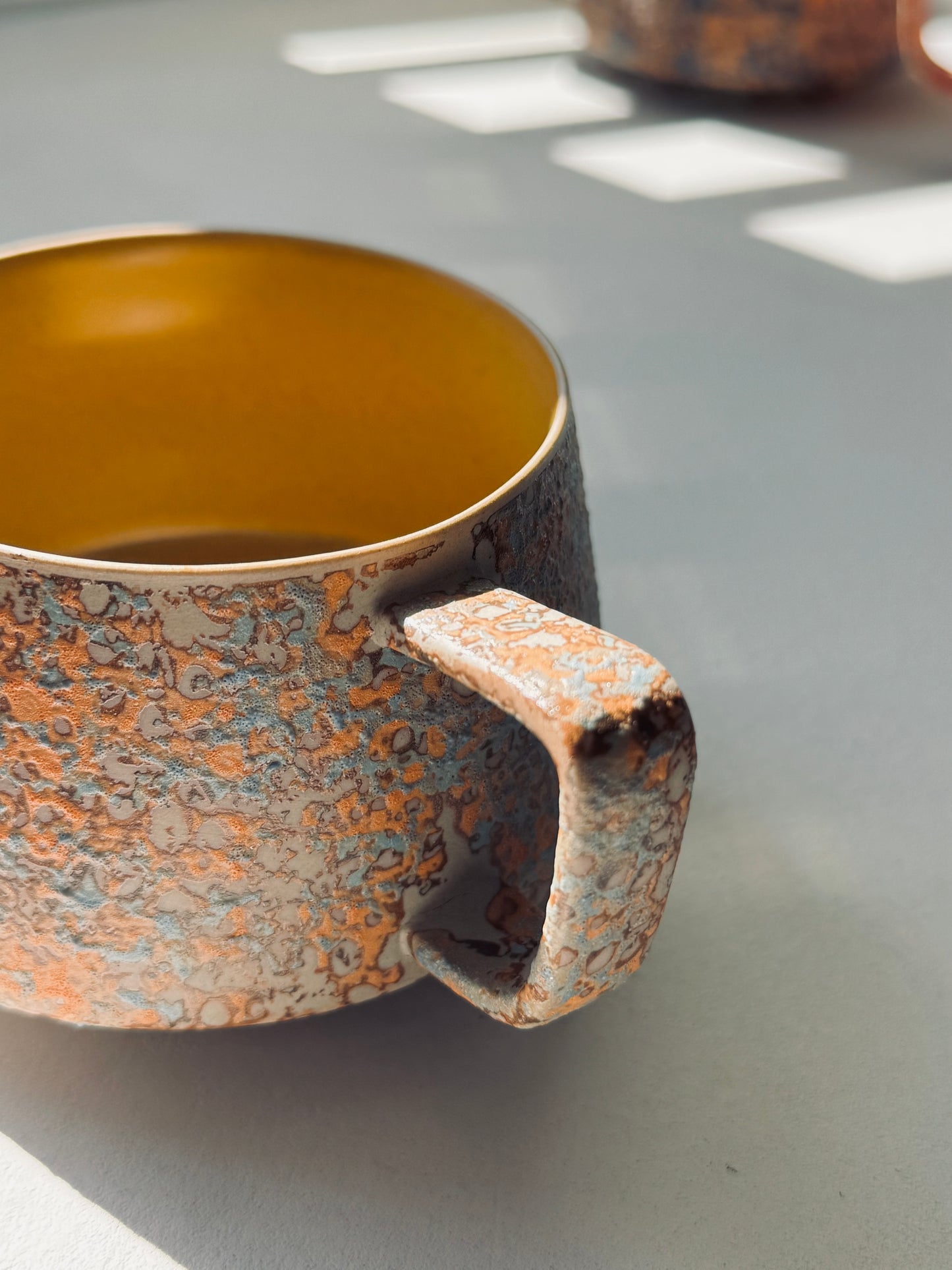 Textured Ceramic Mug – Ocean Ember Edition