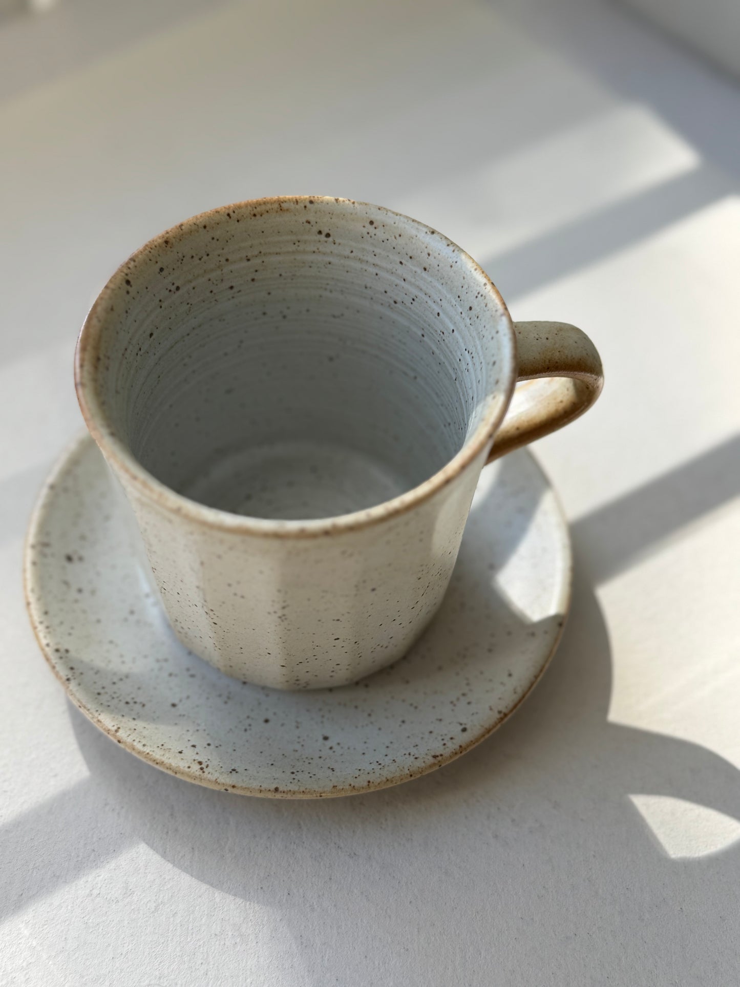Artisan Coffee Cup & Saucer – Ivory Speckle Edition