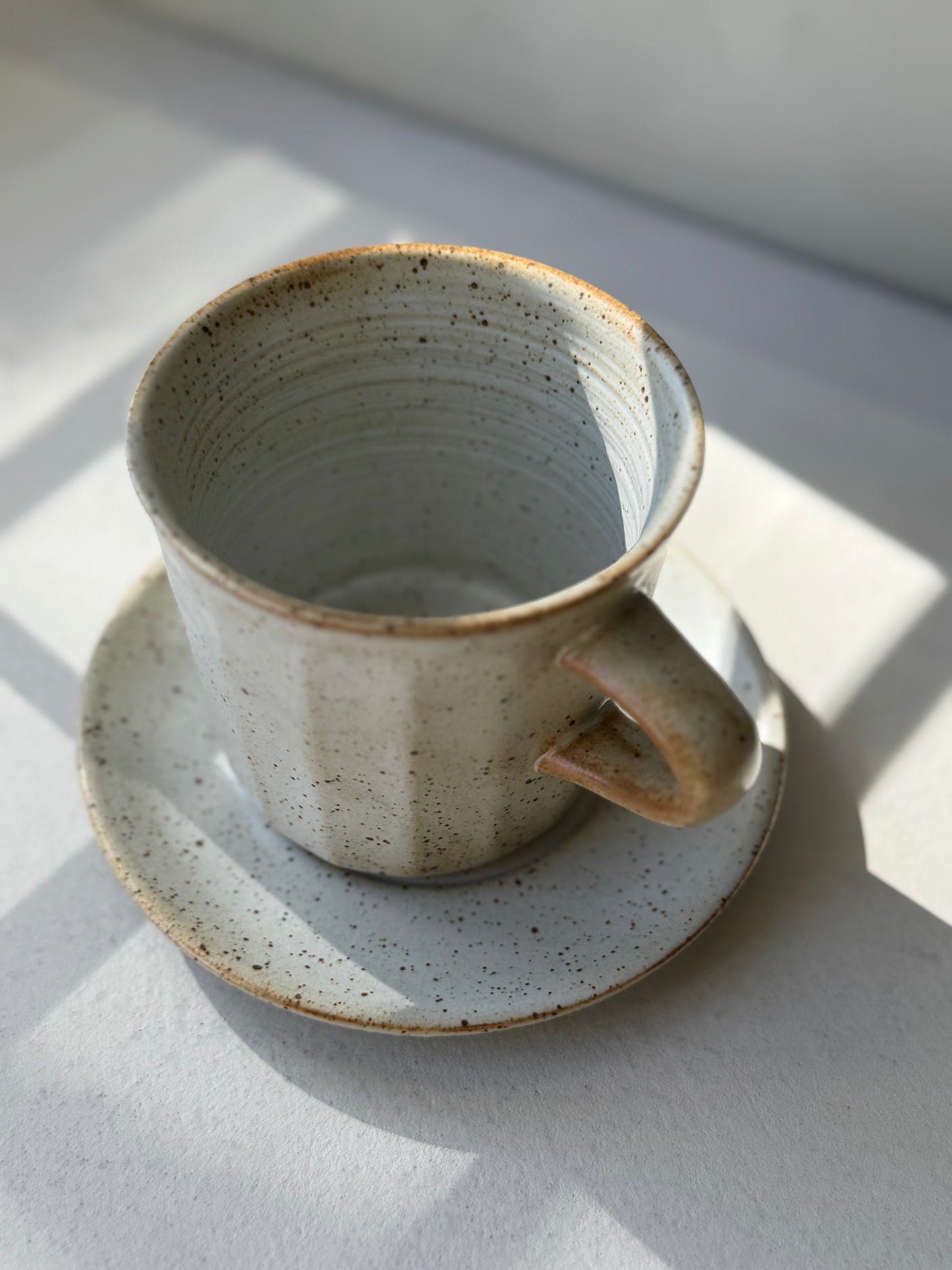 Artisan Coffee Cup & Saucer – Ivory Speckle Edition