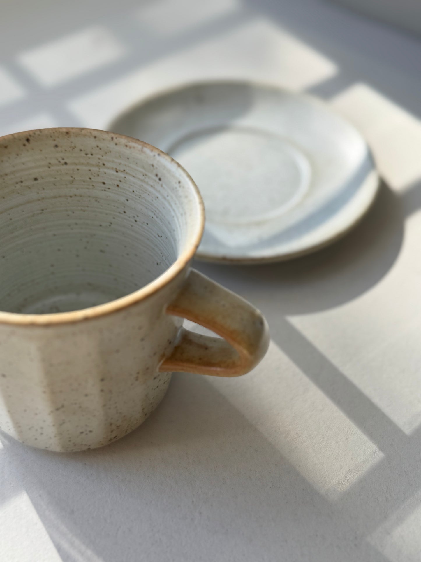 Artisan Coffee Cup & Saucer – Ivory Speckle Edition