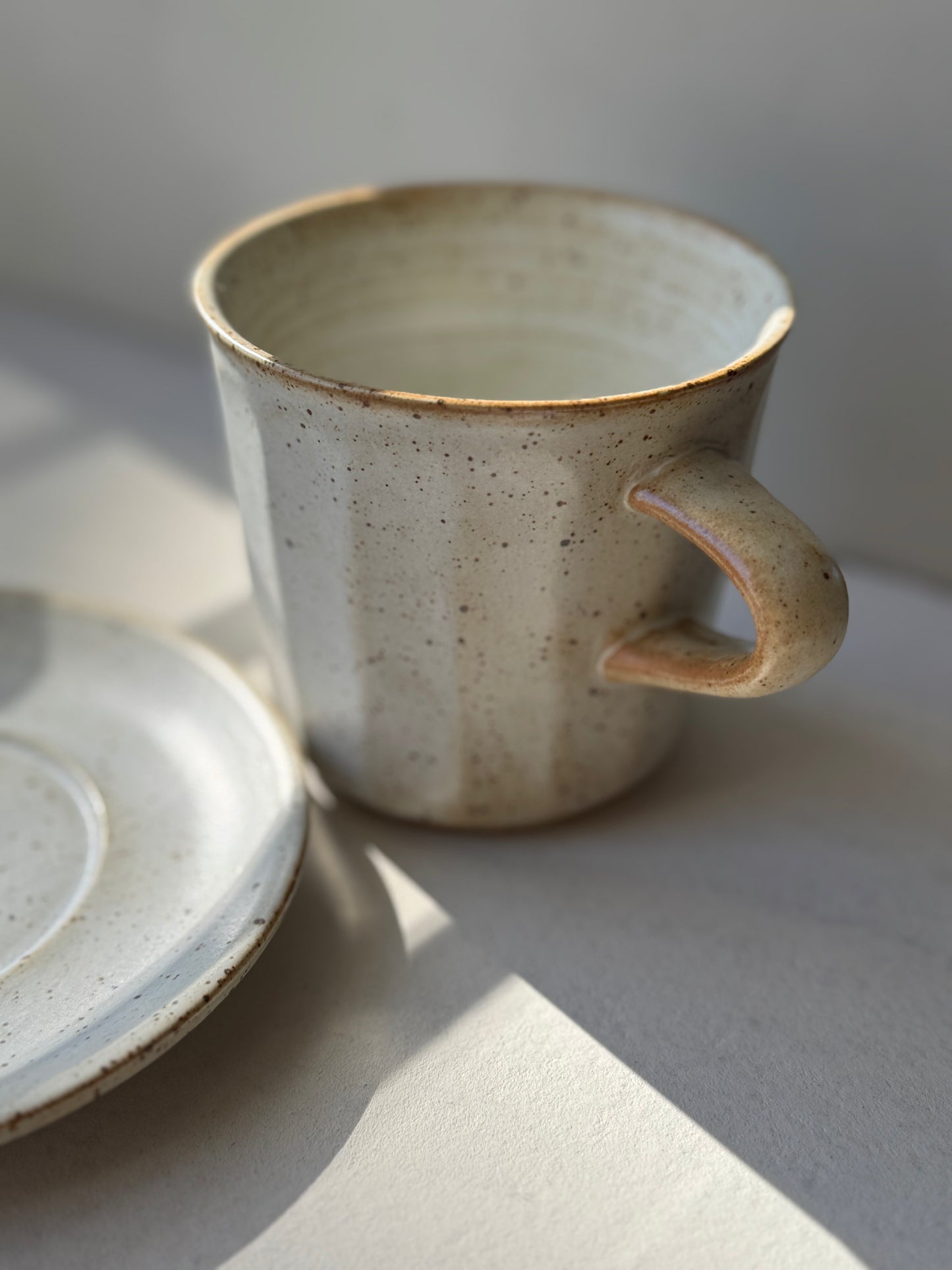 Artisan Coffee Cup & Saucer – Ivory Speckle Edition